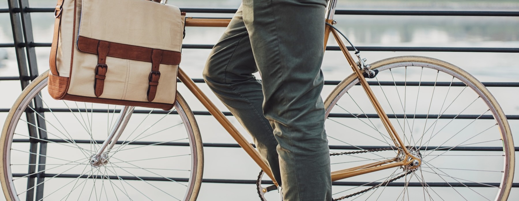 a person with a bag on a bicycle
